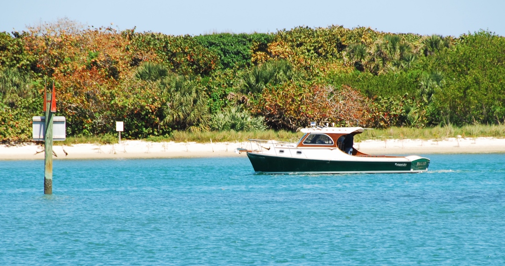 A boat with varnished teak caps