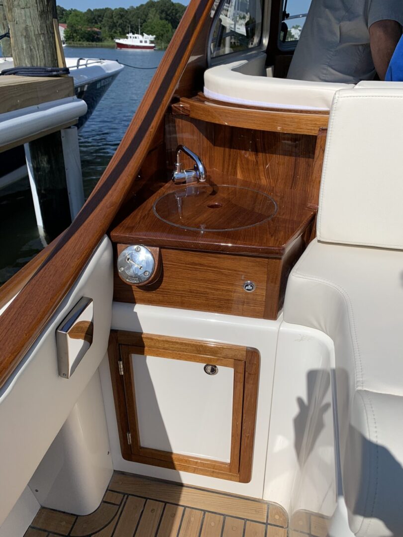 Dark Wood, Wooden Sink With Cabinets in a Boat